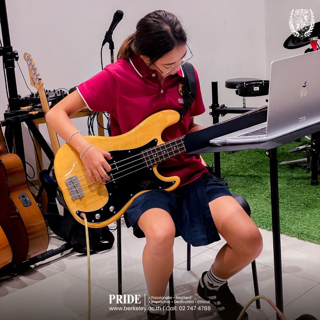 guitar playing student